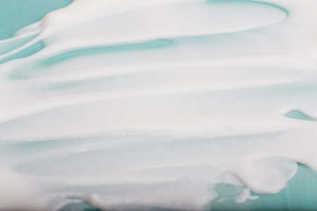 White texture of face or body cream background