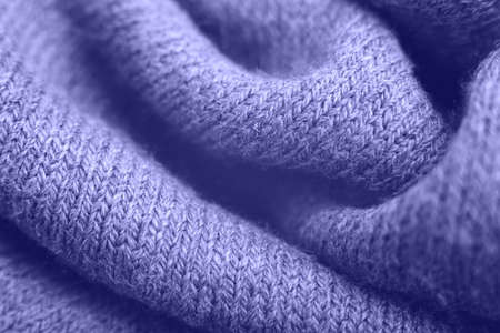 Close up of purple knitted textured background.の写真素材
