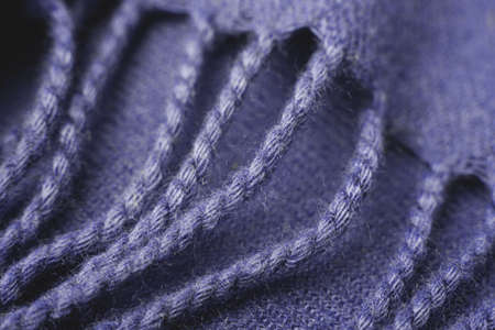 Close up of purple knitted textured background.の写真素材