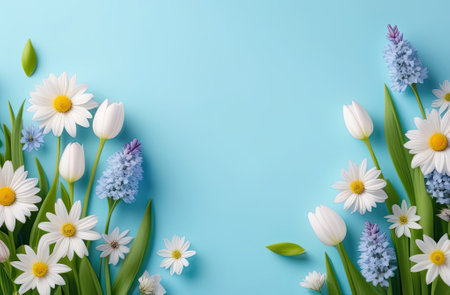 Top view photo of fresh colorful flowers. Colorful flowers decoration. Pastel blue, green and white colors. Greeting card for spring holidays. Template for Birthday, Women's Day, Mother's Day.の写真素材