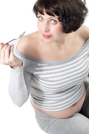 Smiling women eating healthy lifestyle yogurt foodの写真素材