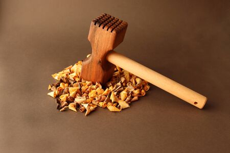 Wooden hammer on wooden colorful flinders の写真素材