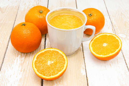 A cup of fresh squeezed orange juice.の写真素材