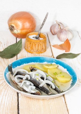 Traditional Karelian fish dish with potatoes and onionsの写真素材