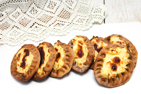 In Karelia very fond of hot tea with wickets. Wickets a traditional Karelian pastries. Bake them mainly with potatoes or porridge.の写真素材