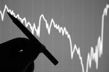 The analysis of the chart of data on the display. Data analyzing in forex market: the charts and quotes on display. Analytics trendsの写真素材