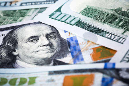 close-up shots in macro lens a few one hundred dollars banknote