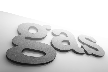 Theme of petroleum, oil refinery industry and business. The word "OIL" composed volumetric uppercase letters on glossy surface background. Black & white photography.の写真素材