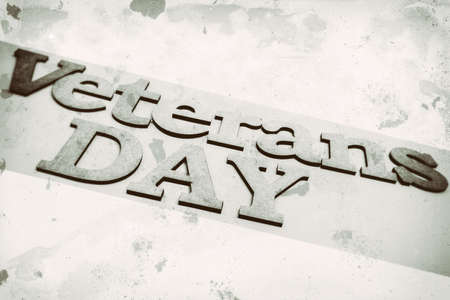Veterans day banner. Veterans Day inscription stylized background as old bw sepia toned photos.の写真素材