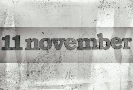 Veterans day banner. Veterans Day inscription stylized background as old bw sepia toned photos.の写真素材