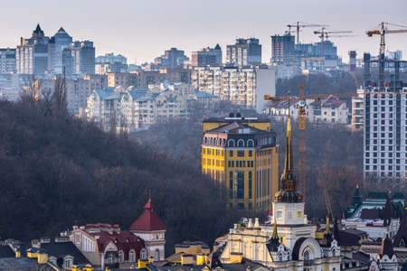 Early spring at sunny evening in warm weather. High rise residential areas around old historic center on the right bank of the Dnipro River. Ukraine Mar. 6, 2019のeditorial素材