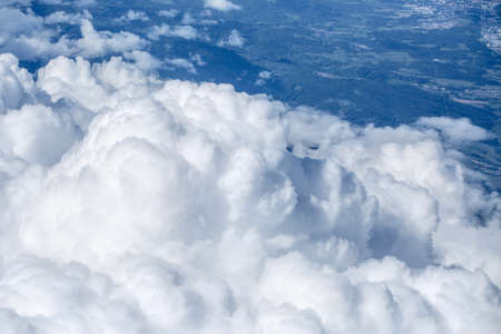 view of the of the beautiful cumulus clouds from the window airplane