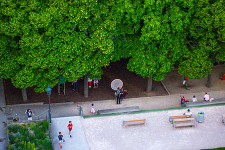 VIENNA, AUSTRIA - MAY 25: People are resting and relaxing in public Weghuberpark park in warm sunny day in Vienna, Austria, on May 25, 2019.のeditorial素材