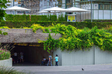 Vienna, Austria, 31 July 2019: Beautiful summer cityscape. View of the gardens and the art nouveau stadtbahn pavillon on Karlsplatz and entrance to the subway station.のeditorial素材
