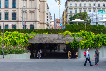 Vienna, Austria, 31 July 2019: Beautiful summer cityscape. View of the gardens on Karlsplatz and entrance to the subway station.のeditorial素材