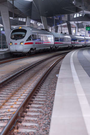 VIENNA, AUSTRIA - MAY 27: The Intercity-Express  Deutsche Bahn ICE train on main railway station of Vienna (Wien Hauptbahnhof) Austrian railways (OBB), in Vienna, Austria, on May 27, 2019.のeditorial素材