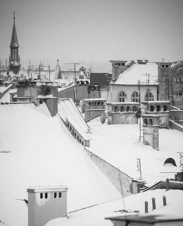 Krakow in Christmas time, aerial view on snowy roofs in central part of city. BW photo. Poland. Europe.の写真素材