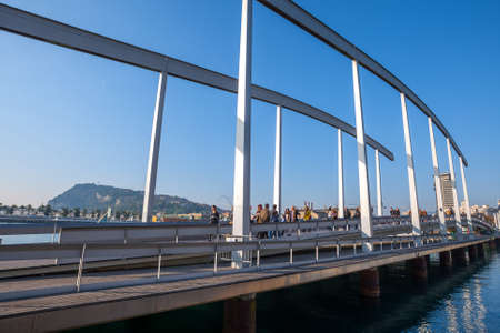 Spain, Barcelona - Dec 29, 2011: People Local and tourists have are rest and relaxing and walk in a...