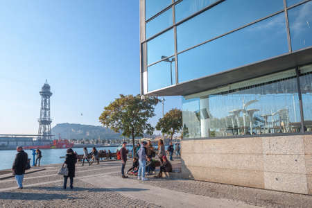 Spain, Barcelona - Dec 29, 2011: People Local and tourists have are rest and relaxing and walk in a...
