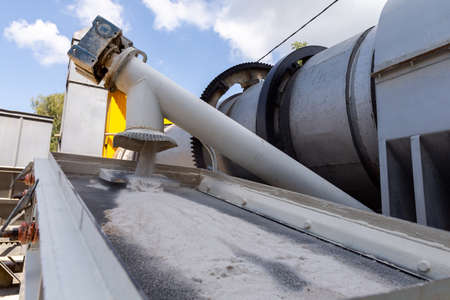 Industrial production of construction mixtures. Tower silos with bulk ingredients. Line for drying and sorting of sand.の写真素材