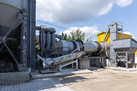 Industrial production of construction mixtures. Tower silos with bulk ingredients. Line for drying...