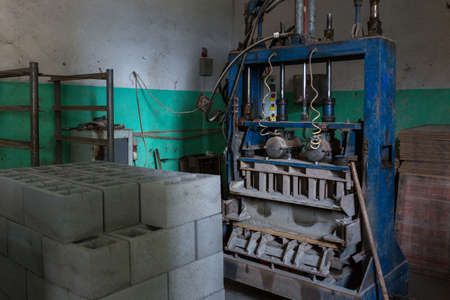 Industrial production of building cement pressed materials. High quality hollow concrete block or...