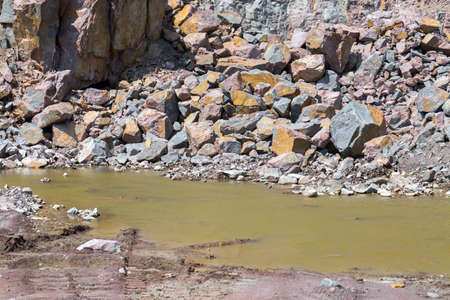 Spectacular view of quarry open pit mining of granite stone. Process production stone and gravel....
