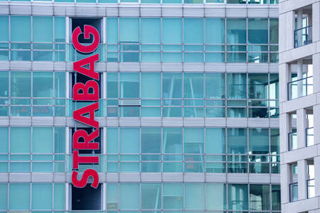 VIENNA, AUSTRIA - JULY 31: Building of headquarters STRABAG AG, one of the largest construction companies in Europe with logo, in Vienna Donau city in Vienna, on July 31, 2019.のeditorial素材