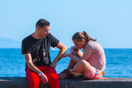 Naples, Italy - may 27: Summer day on the Mediterranean coast. People relax walking, sunbathe and...