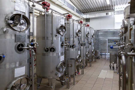 Stainless steel barrels and tanks and other containers for liquids in the food industry. Industrial...
