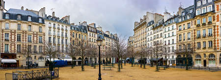 Panoramic view in autumn weather on the Place Dauphin on the island of CitÃ© near Pont Neuf in the first district of Paris.のeditorial素材