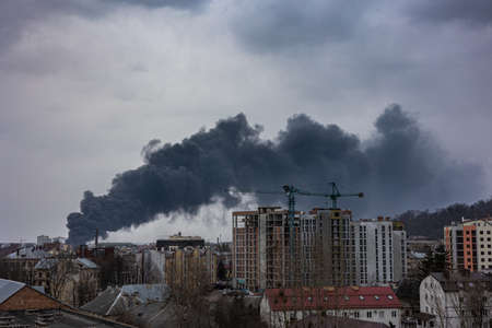 LVIV, UKRAINE - March 26, 2022: Destruction of civilian infrastructure by the russian army. Consequences of a missile strike on an oil storage facility. Aggression war russia against Ukraine.のeditorial素材