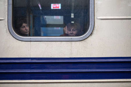 LVIV, UKRAINE - APR 02, 2022: Humanitarian catastrophe during at war in Ukraine. Refugees from the war-torn territories in eastern Ukraine are flees to Europe at the Lviv Railway Station.のeditorial素材
