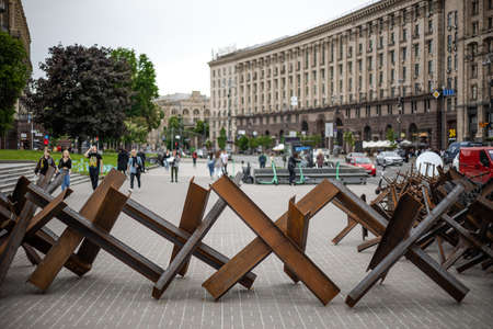 KYIV, UKRAINE - MAY 20, 2022: Anti-tank hedgehogs or Czech hedgehogs on the side of the road are ready to block Independence Square in the event of an attack by enemy Russian troops.のeditorial素材