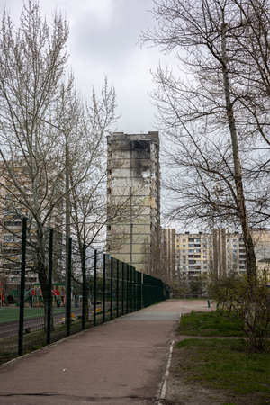 KYIV, UKRAINE - APR 21, 2022: The rooftop and apartments of an apartment building on Poznyaky was destroyed by the Kalibr cruise missile at the 17 march of the full-scale Russian invasion of Ukraineのeditorial素材