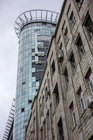 KYIV, UKRAINE - MAY 22, 2022: Office building near Lukyanivska metro station wich was destroyed by russian cruise missile at the 15 March of the full-scale Russian invasion of Ukraineのeditorial素材
