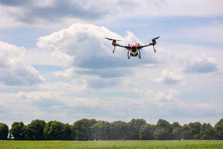 A modern solution in agricultural. Use of robotic systems with agriculture spraying drone fly to...
