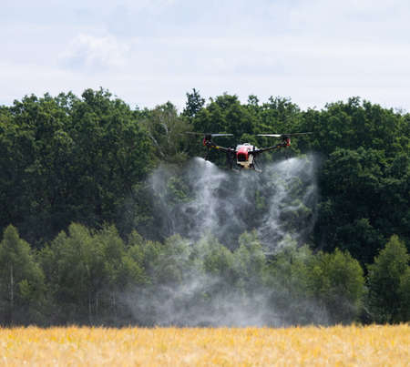 A modern solution in agricultural. Use of robotic systems with agriculture spraying drone fly to...