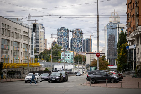 Kyiv, Ukraine - OCT 01, 2022: View on Shota Rustaveli street and Cherepanova Gora district at warm autumn weekend. A picture of everyday cars traffic in the street a big city.のeditorial素材