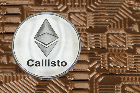 Callisto coins on gold circuit background. Cryptocurrency CLO.