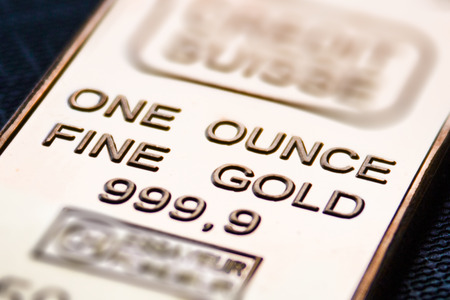 the small  gold bar is one ounce. Pure gold.の写真素材