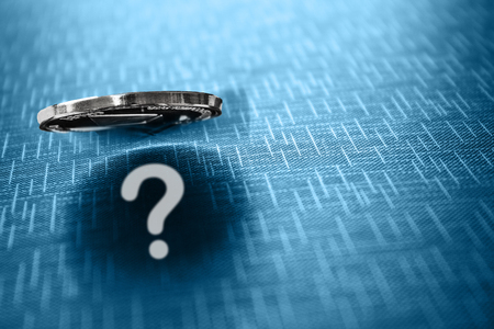 Throw a coin with a question. Question in the shadow of a flying coin.