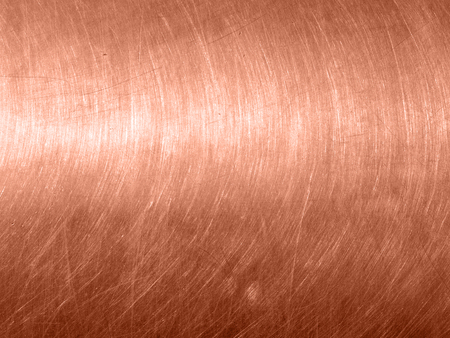 The copper metal texture with circular scratches.の写真素材