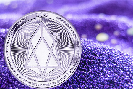 Coin cryptocurrency EOS and neon fabric background.の写真素材
