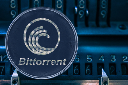 Coin cryptocurrency Bittorrent and the numbers of the arithmometer. The concept of BTT.の写真素材