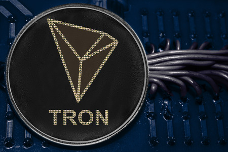 The coin cryptocurrency Tron on the background of wires and circuits. Token TRX.の写真素材