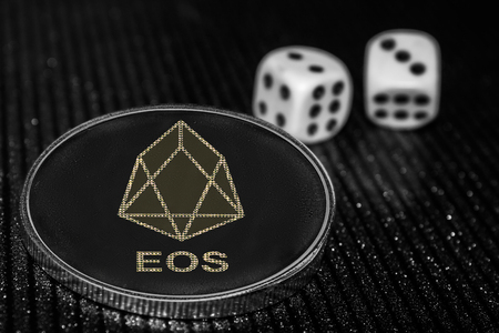 the coin cryptocurrency  EOS and rolling dice.の写真素材