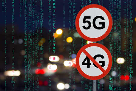 Signs 5G no 4G and the night road with cars and matrix dataの写真素材