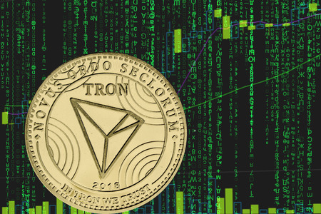 token trx tron  cryptocurrency on the green matrix background of binary crypto price chart.の写真素材