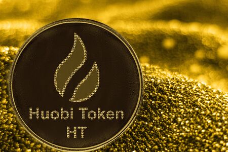 Coin cryptocurrency HT and gold fabric background. huobi token logo.の写真素材